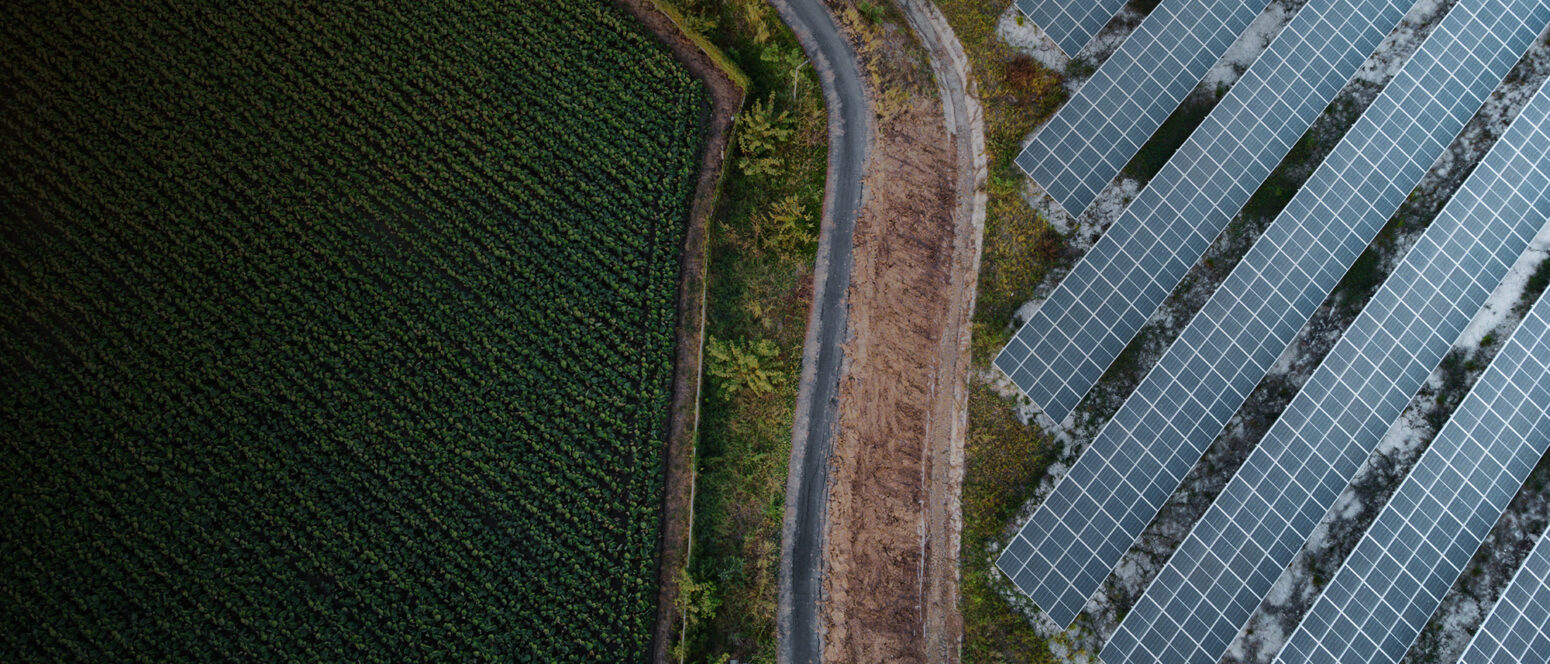 Arial view of crops and solar panels